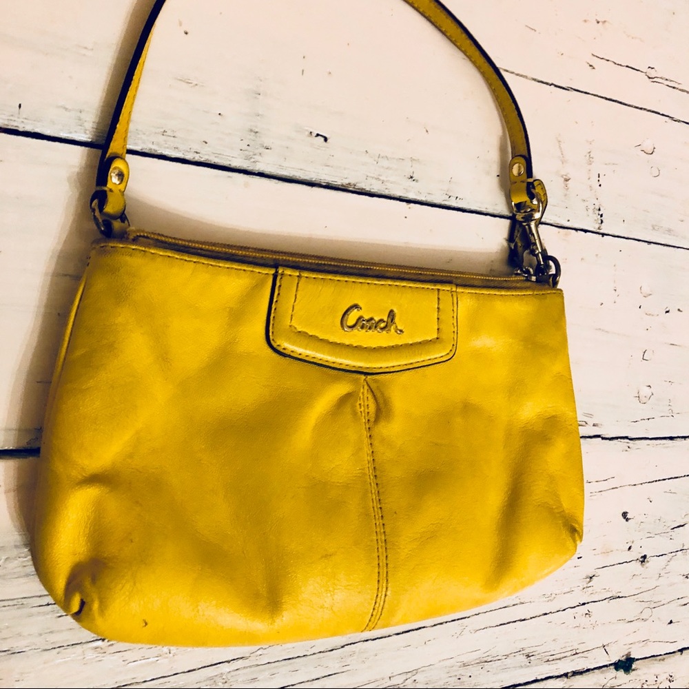 Yellow Coach Wristlet.